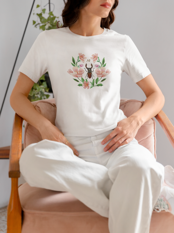 mockup-of-a-woman-wearing-a-bella-canvas-t-shirt-on-a-chair-m37309 2.png